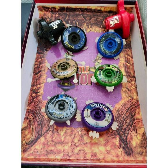 Battle Tops by Idea Village with Bonus Battle Arena and 6 Tops & 2 Launchers.  T - Picture 3 of 4